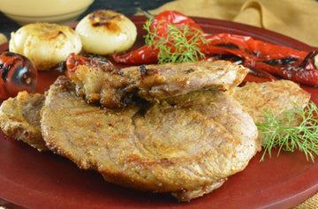Grilled Veal Steak with Peppers and Onions